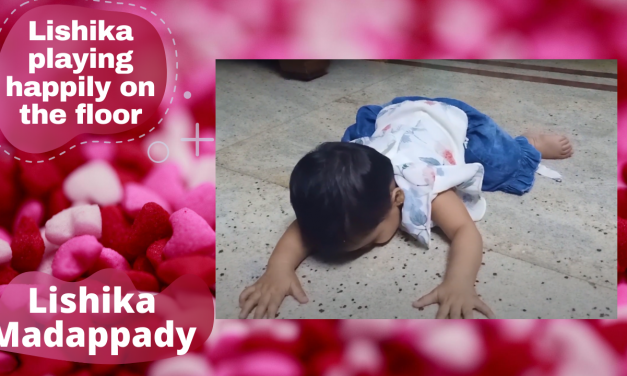 Lishika playing happily on the floor